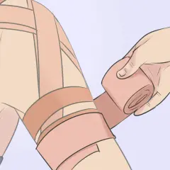 Application d'un strap pour soulager une tendinite à l'épaule.