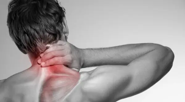 Douleur au cou et aux épaules, avec une zone rouge sur le muscle trapèze, suggérant une tension ou une traction.